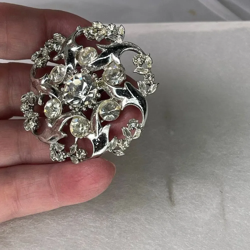 Vintage rhinestone swirl starbust open cut atomic area brooch. - Picture 4 of 7
